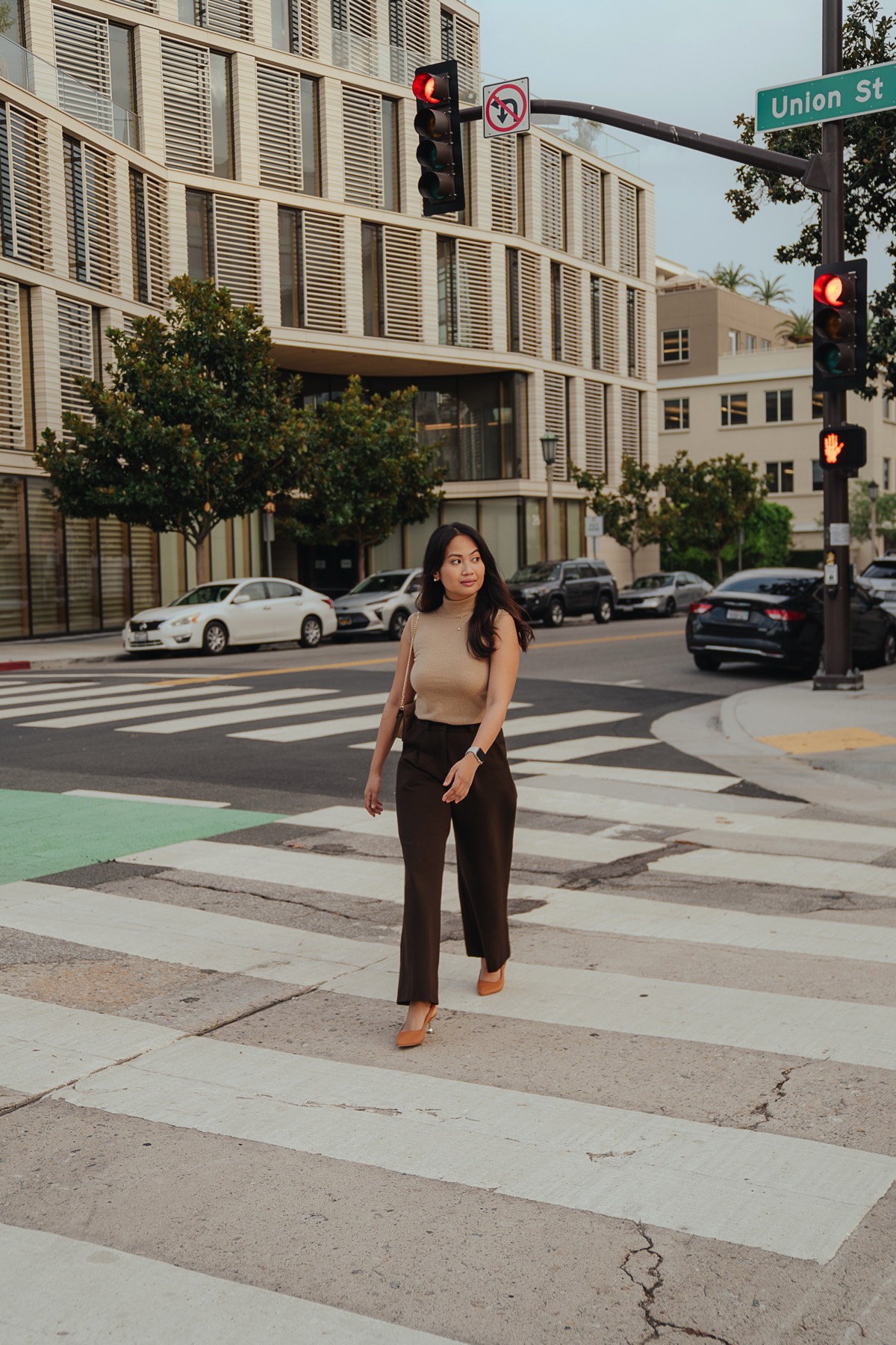 Denise Chicano crossing the street